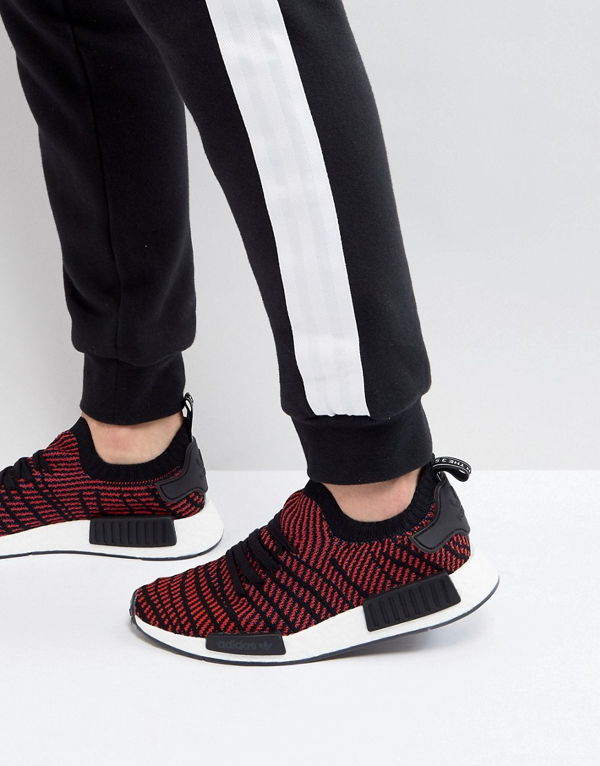 adidas originals nmd r1 trainers in black with red heel block